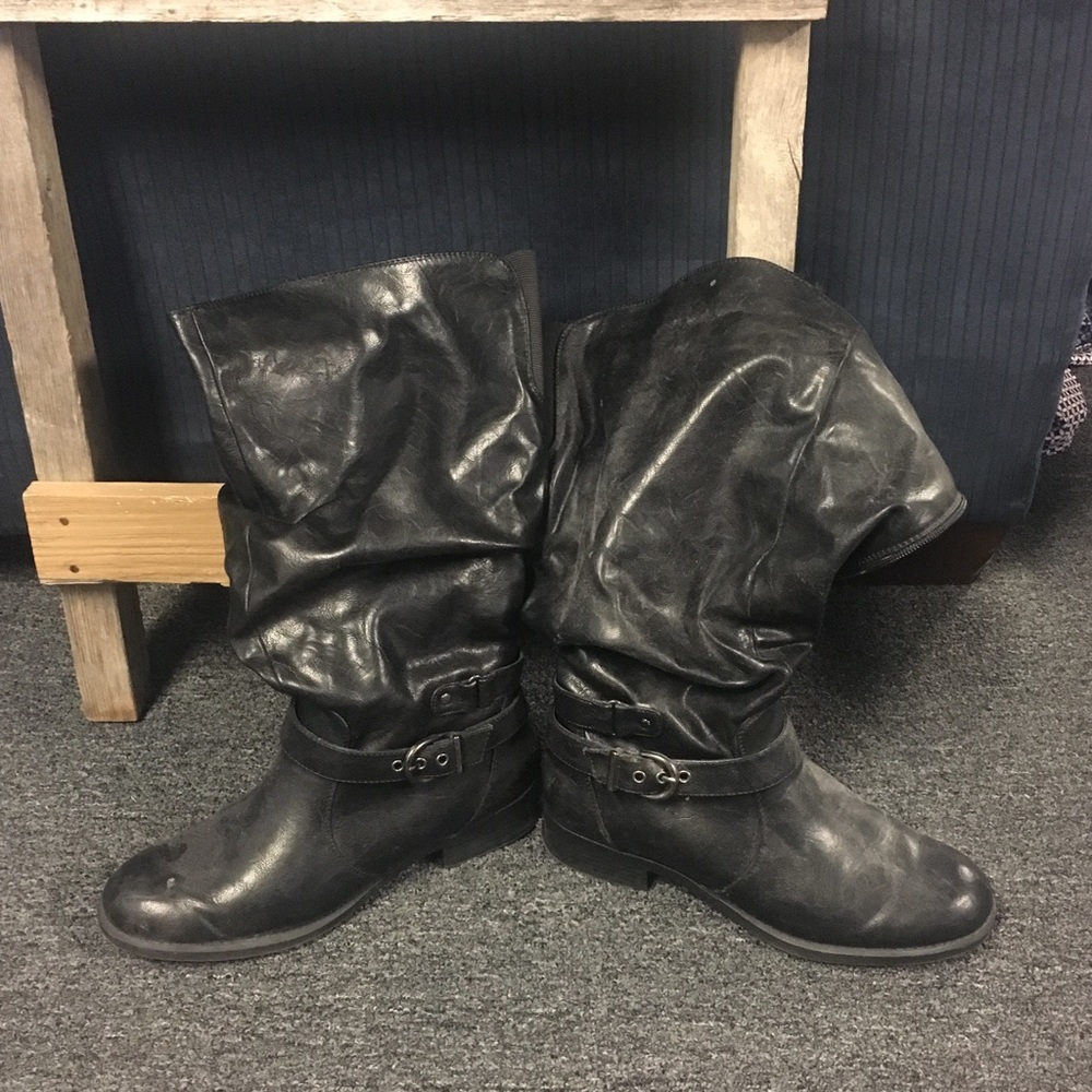 Tall black boots.